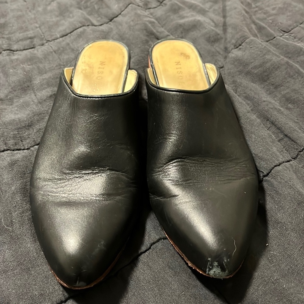 Used condition. Nisolo black mules, size 9